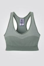 טופ מבית המותג REEBOK, בד נמתך שמאפשר תנועה חופשית . רפידות נשלפות להתאמה מושלמת