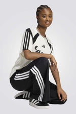 מכנסיים ארוכים HOUSE OF TIRO לנשים | אדידס