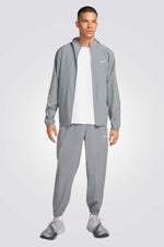 מעיל רב תכליתי עם קפוצ'ון בצבע אפור לגברים | נייקי