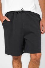 מכנסים קצרים מבד סקובה