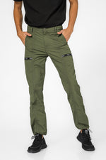 מכנסי פרפורמנס בד מצנחים ירוק זית