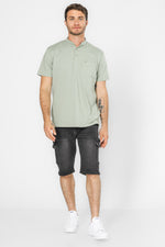 חולצה עם כיס בצבע ירוק