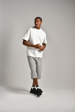 טי שירט אוברסייז עם דפוס בגב