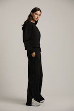 מכנסי טרנינג רחבים עם כפתורים בצד | קנת קול