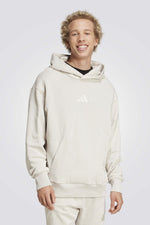 סווטשירט קפוצ'ון מבית המותג ADIDAS, כיסים קדמיים לשמירה על החפצים. גזרה קלאסית עם הדפס המותג מקדימה.