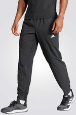 מכנסיים ארוכים לגברים TRAIN ESSENTIALS WOVEN בצבע שחור