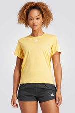 טישירט לנשים AEROREADY TRAIN ESSENTIALS 3-STRIPES בצבע צהוב