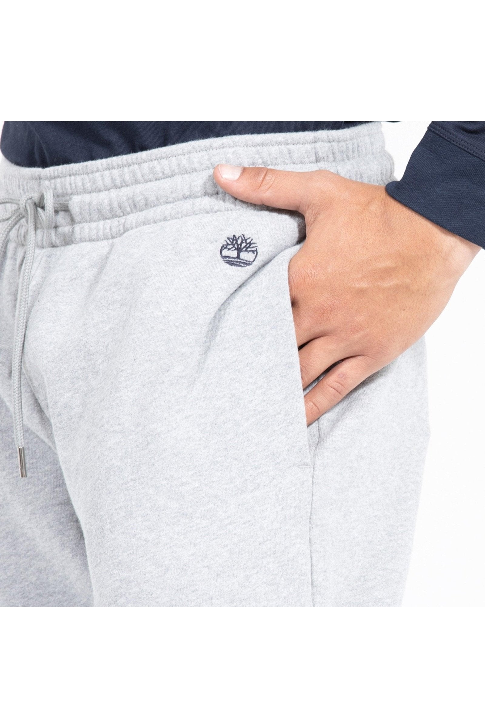 TIMBERLAND - מכנסי טרנינג עם לוגו המותג רקום בצד צבע אפור - MASHBIR//365