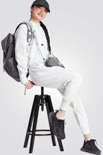 ADIDAS - מכנסיים ארוכים לנשים Z.N.E בצבע לבן - MASHBIR//365