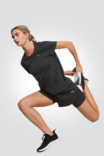 PUMA - מכנסיים קצרים RUN FAVORITE לנשים בצבע שחור - MASHBIR//365