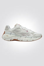 REEBOK - נעלי ספורט לנשים Zig Kinetica 2.5 Plus בצבע לבן - MASHBIR//365
