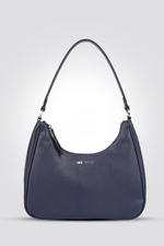 תיק מבית המותג NINE WEST בעלת תא איחסון פנימי בסגירת רוכסן לשמירה על החפצים שלך בדרך הנוחה ביותר. רצועה עליונה לנשיאה נוחה