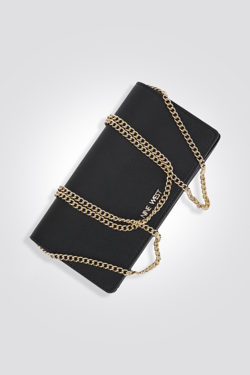 ארנק מבית המותג NINE WEST , בעל תא איחסון פנימי לשמירה על החפצים הקטנים שלך. רצועה בדמוי שרשרת לנשיאה על הכתף בצורה אופנתית במיוחד