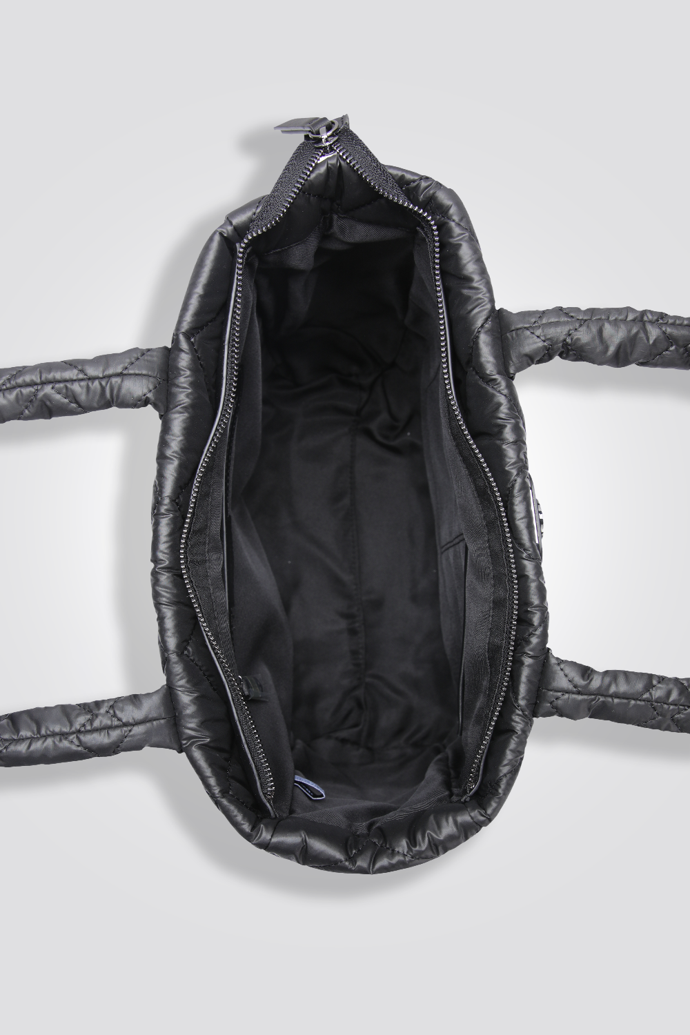 תיק יד מרופד