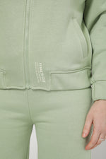 סווטשירט עם רוכסן לוגו בגב בצבע ירוק