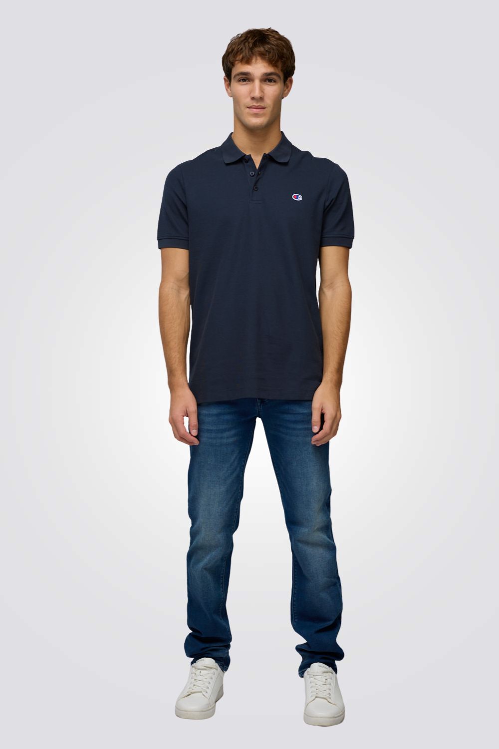 חולצת פולו בצבע נייבי עם לוגו | צ'מפיון