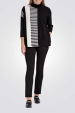 פונצ'ו בצבע שחור/לבן