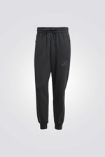 מכנסי טרנינג בצבע שחור | אדידס