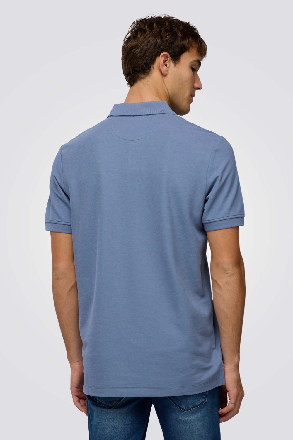 חולצת פולו בצבע ירוק כהה עם לוגו | צ'מפיון 