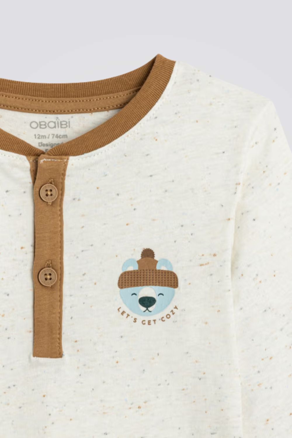 טי‑שירט ג׳רזי שמנת עם הדפס חיות | אוקיידי