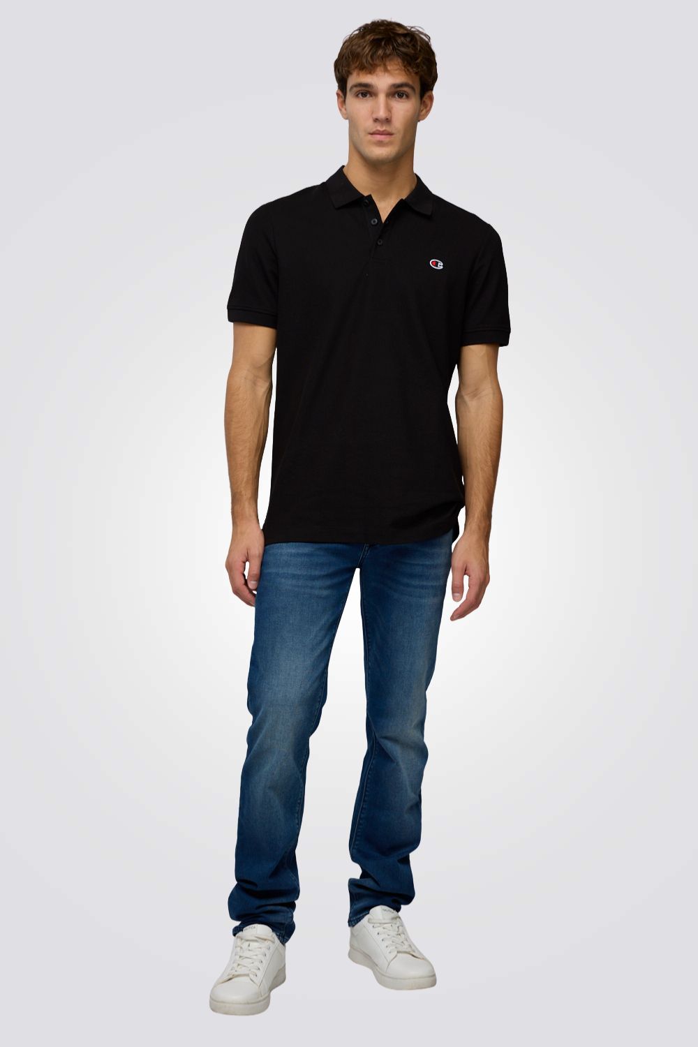 חולצת פולו שחורה עם לוגו | צ'מפיון 
