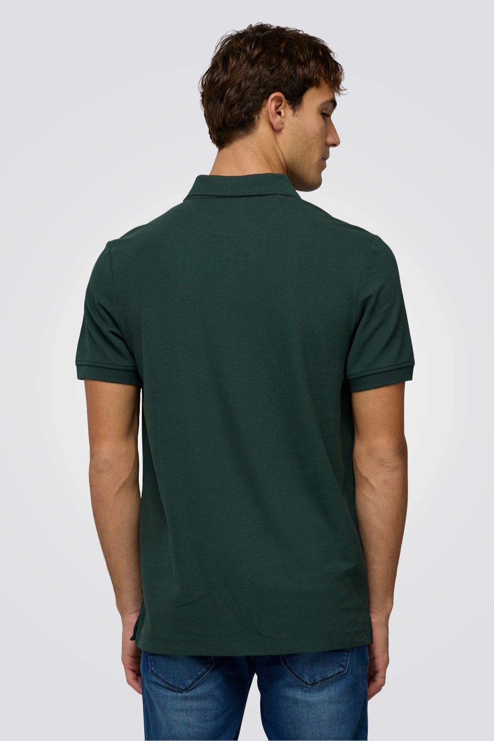 חולצת פולו בצבע ירוק כהה עם לוגו | צ'מפיון