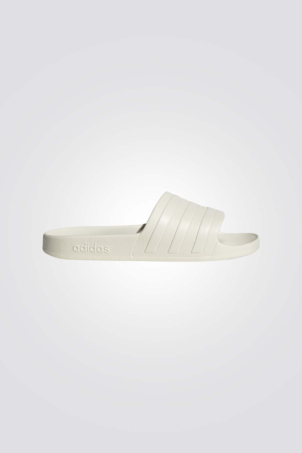 כפכפים ADILETTE AQUA בצבע שמנת 