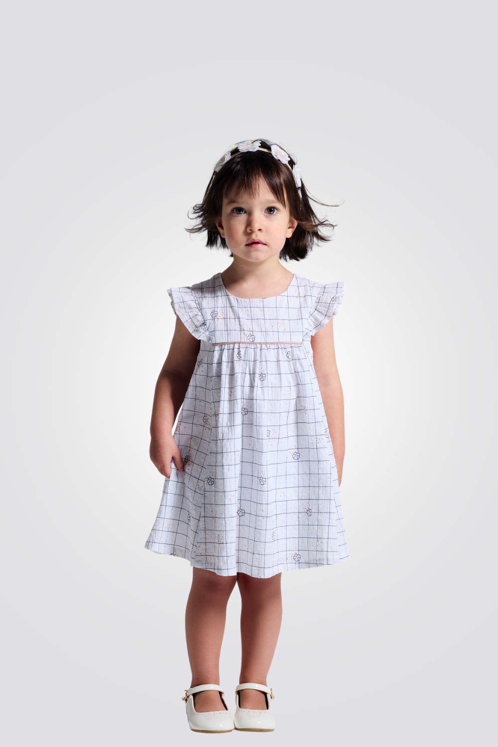 שמלה חגיגית לתינוקות בצבע לבן עם הדפס 