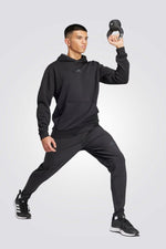 סווטשירט אימון עם קפוצ'ון לגברים בצבע שחור 