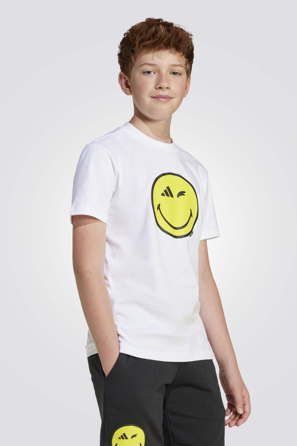 חולצת טי שרט adidas x Smiley World Graphics לילדים ונוער