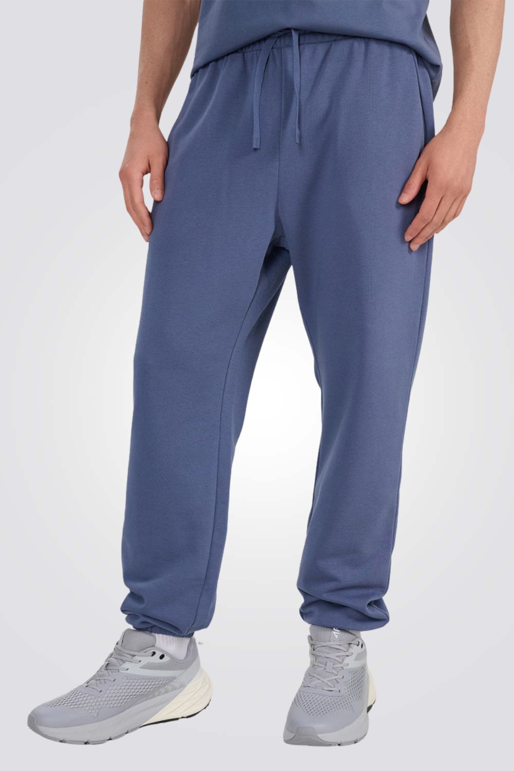 מכנסי טרנינג עם סיומת גומי לגברים | 4F