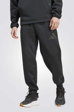 מכנסי טרנינג בצבע שחור | אדידס