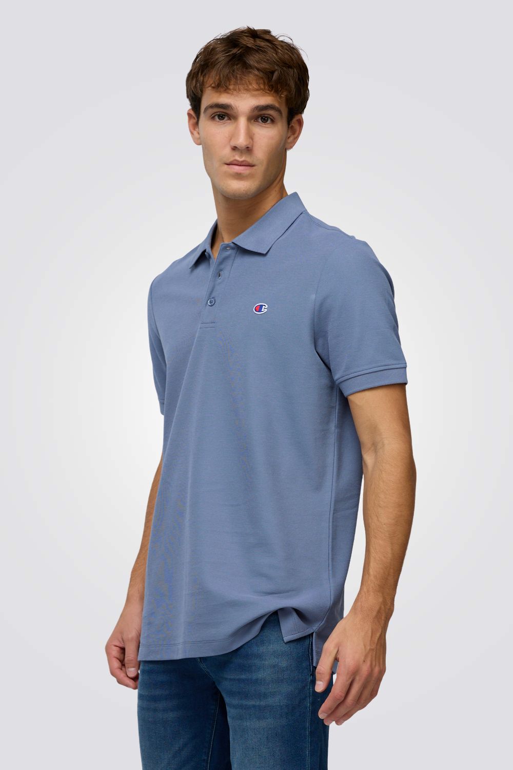 חולצת פולו בצבע ירוק כהה עם לוגו | צ'מפיון 