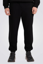 מכנסי טרנינג עם סיומת גומי לגברים | 4F