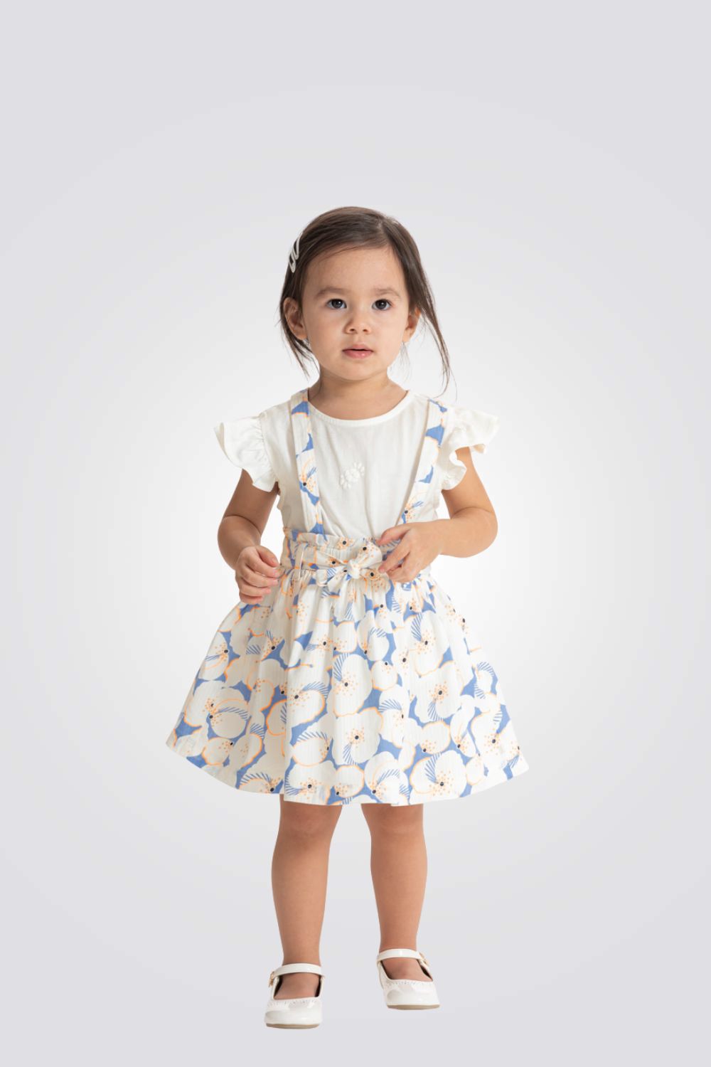 סט חצאית פרחונית עם כתפיות וטישירט לבנה לתינוקות