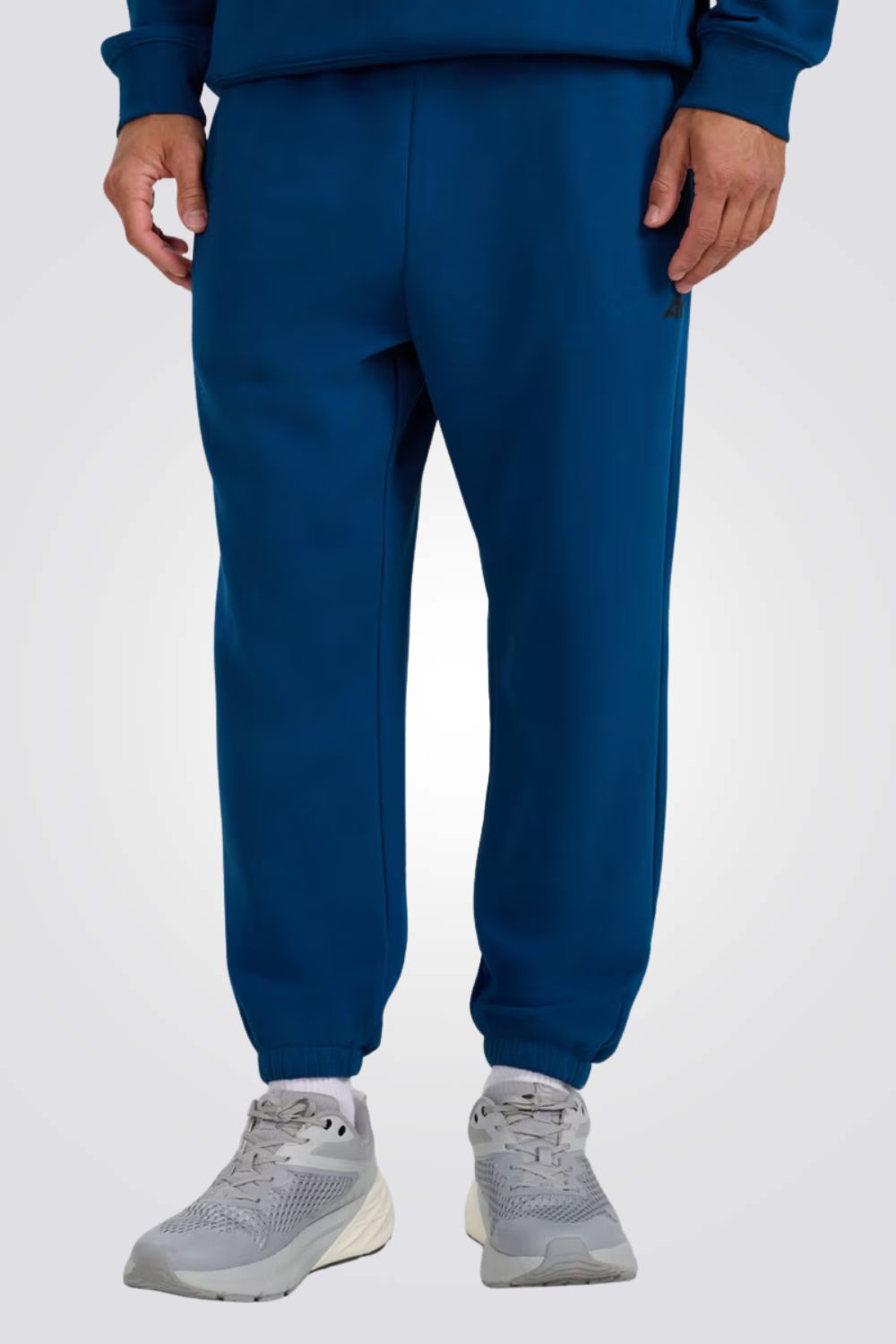 מכנסי טרנינג עם סיומת גומי לגברים | 4F