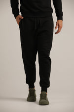 מכנסי טרנינג עם גומי בעקב | קנת קול