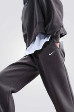 מכנסי טרנינג עם סיומת צמודה | נייקי 