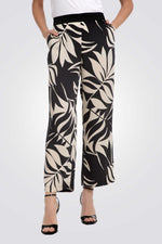 מכנסיים ארוכים הדפס עלים בצבע שחור/שמנת