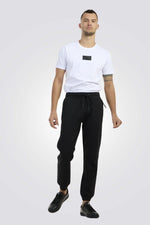 מכנסי טרנינג ספורטיביים בצבע שחור