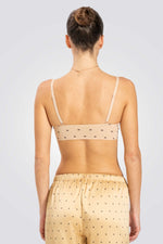 טופ משולשים לייזר קאט מונוגרם בצבע ניוד