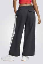 מכנסיים ארוכים ממותגים לנשים | אדידס