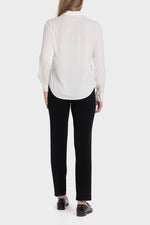 חולצה מכופתרת בצבע שמנת