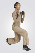 מכנסיים ארוכים בגזרה רחבה לנשים | אדידס 