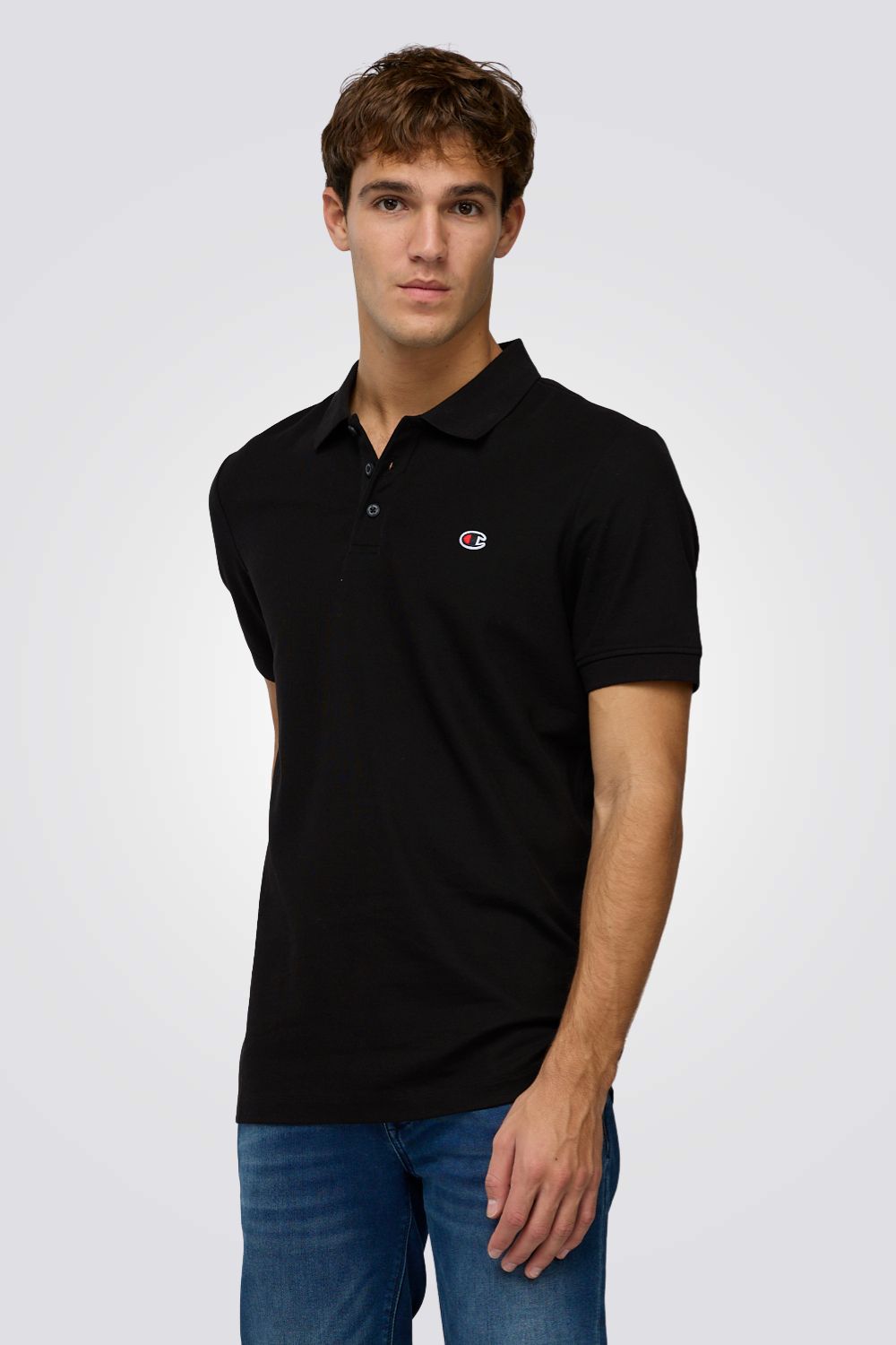 חולצת פולו שחורה עם לוגו | צ'מפיון 

