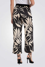 מכנסיים ארוכים הדפס עלים בצבע שחור/שמנת