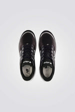 נעלי ספורט בגווני שחור ולבן לגברים | ניו באלאנס