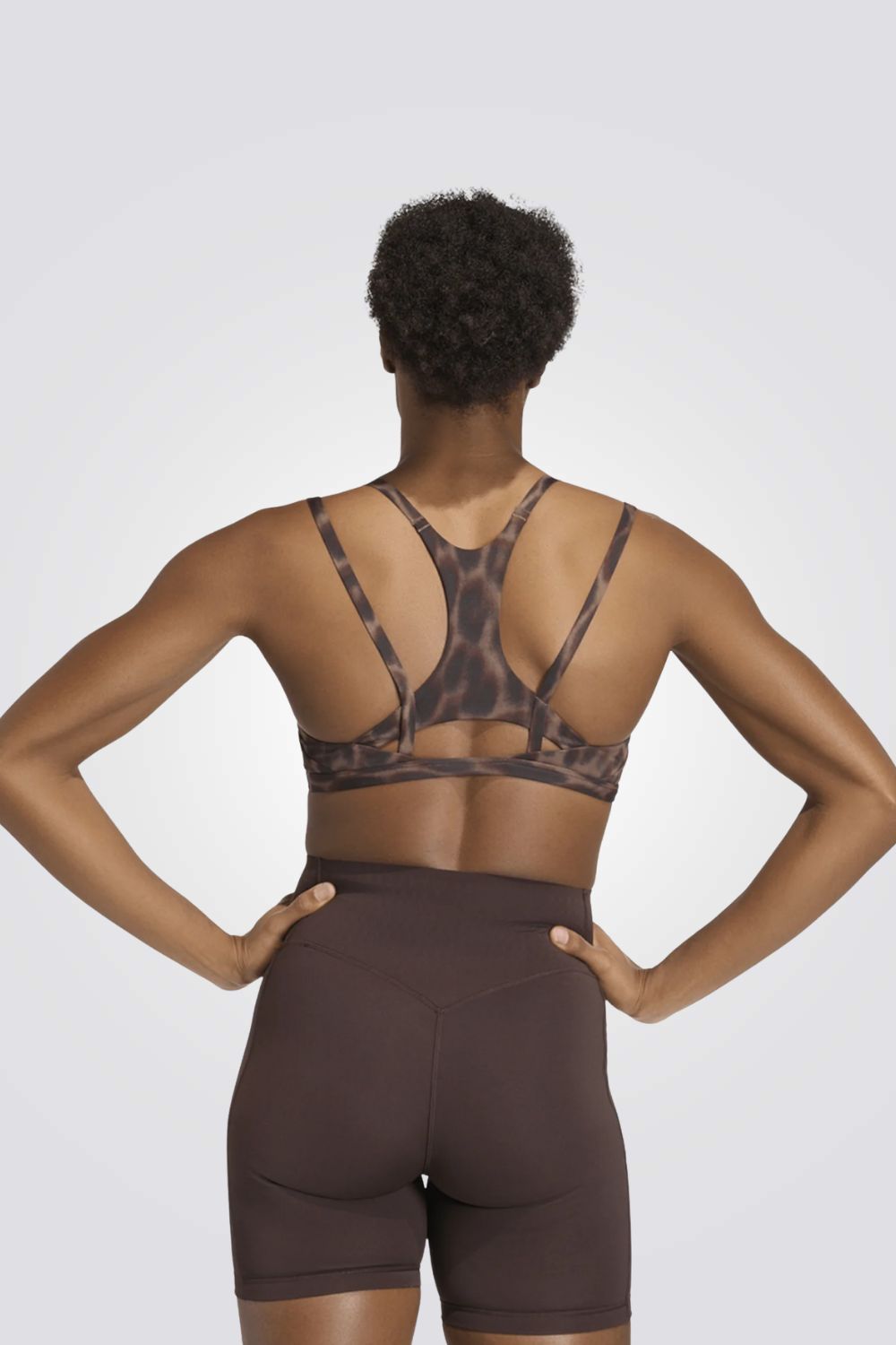 גוזיית ספורט Optimé Leopard Strappy לנשים | אדידס