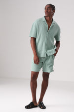 חולצת סריג מכופתרת בטקסטורת משבצות