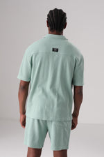 חולצת סריג מכופתרת בטקסטורת משבצות